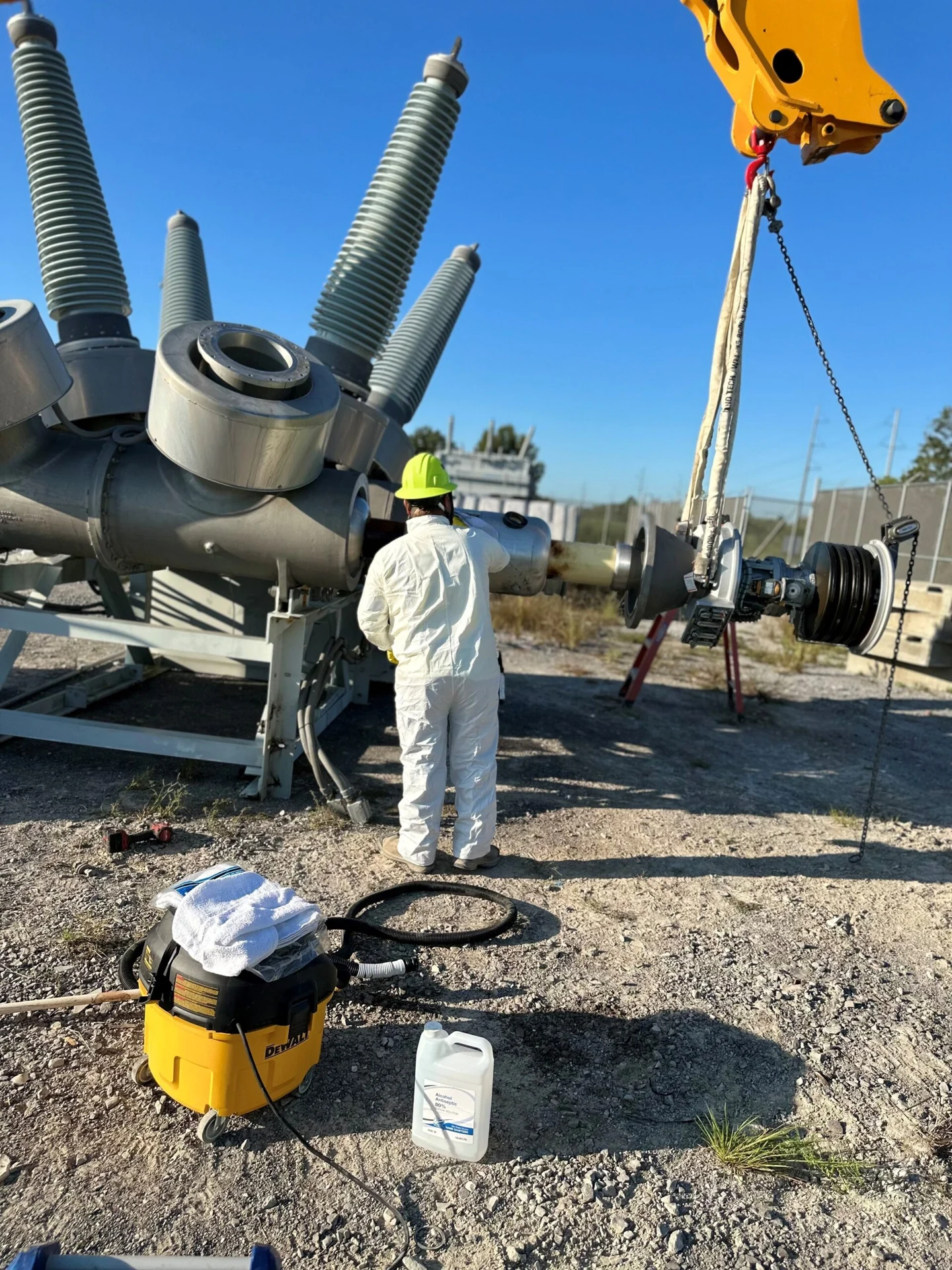 Crew working on substation apparatus.