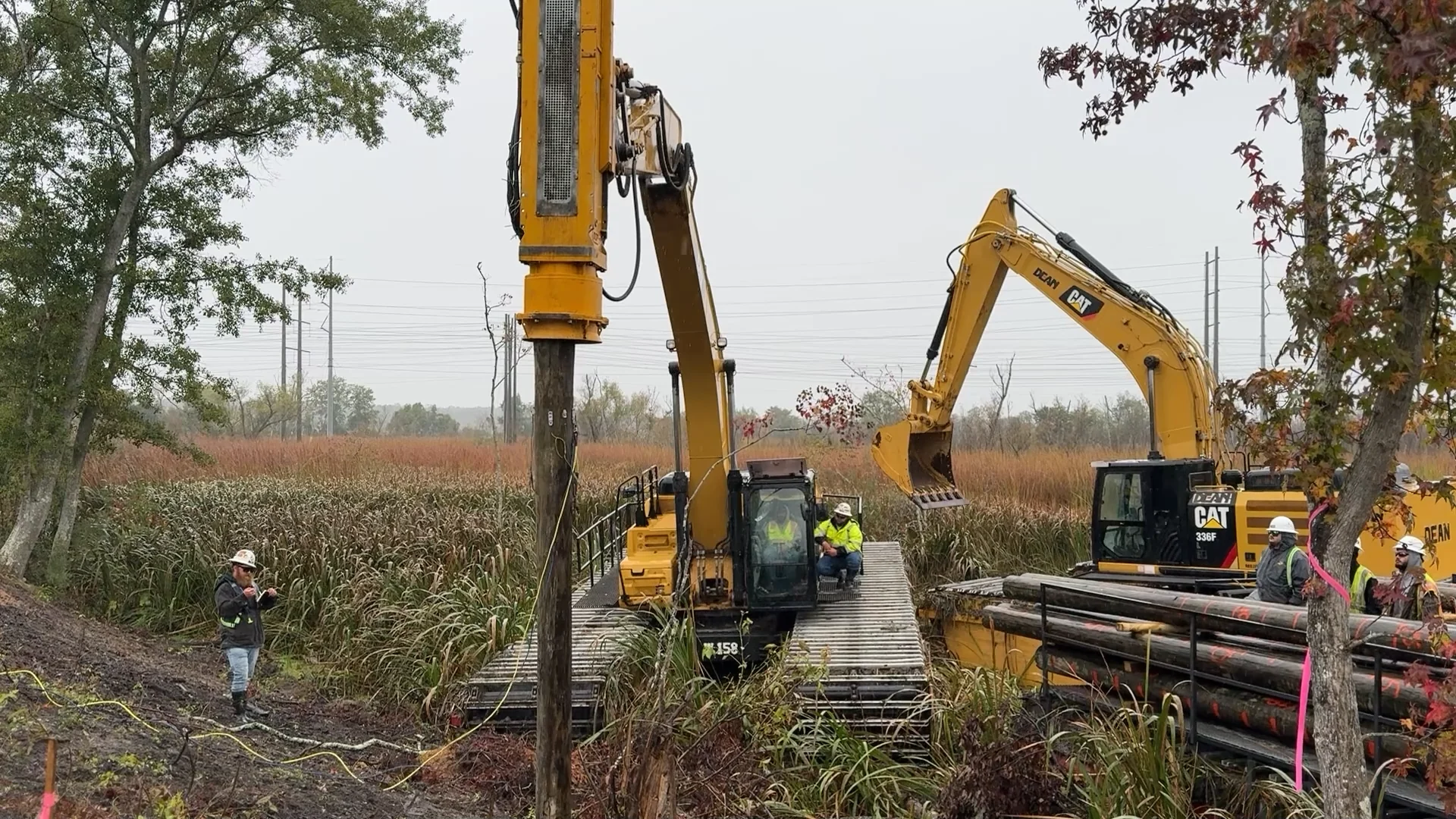 Pile-driving equipment working in wet ground.