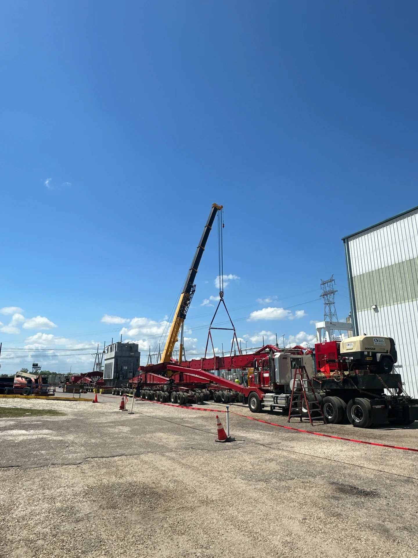 Crane and rigging for a transformer replacement at a generating station.